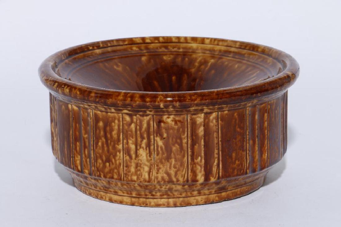 A BENNINGTON SPITTOON, 19THC.: MINOR CHIPS TO BASE, DIAMETER 11 INCHES 