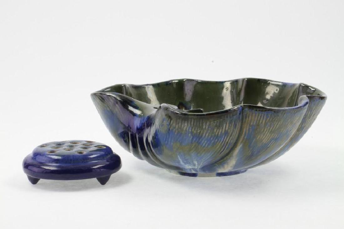 FULPER POTTERY FLAMBE GLAZED SHELL BOWL & FLOWER FROG: BOWL HEIGHT 3 1/2 INCHES, WIDTH 11 1/4 INCHES, DEPTH 9 1/2 INCHES. FROG (UNMARKED) HEIGHT 1 1/2 INCHES, DIAMETER 4 11/2 INCHES.