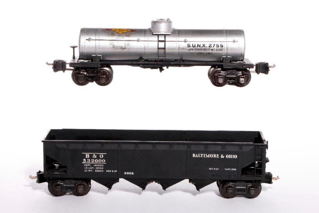 Lionel Prewar Semi-Scale 2956 Hopper+2755 SUNX Tank Car: Superb Lionel prewar O gauge 2956 hopper with 2755 SUNX tank car. Tank car may need coupler shoe repair and is C7. Hopper is C7-C8.