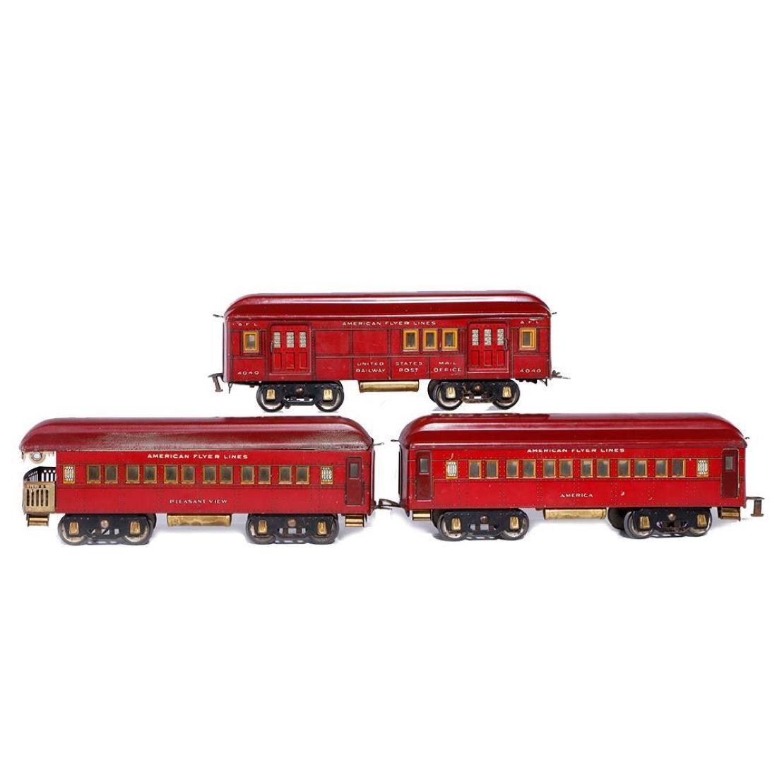 American Flyer Litho Standard Gauge Passenger Cars: Three car set of American Flyer standard gauge lithographed cars comprising 4040 RPO car, America coach, and Pleasant View observation. 4040 has some overspray on roof, observation roof is rough. Cars