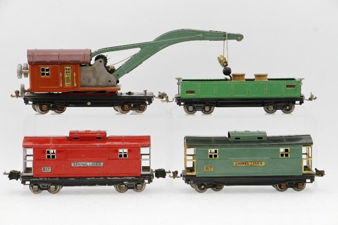 Lionel O Gauge: #810 crane (missing (1) handrail), terra cotta, maroon roof; #812 gondola, light green; #817 caboose (missing (1) journal), peacock, dark green roof; #817 caboose, red, C-5