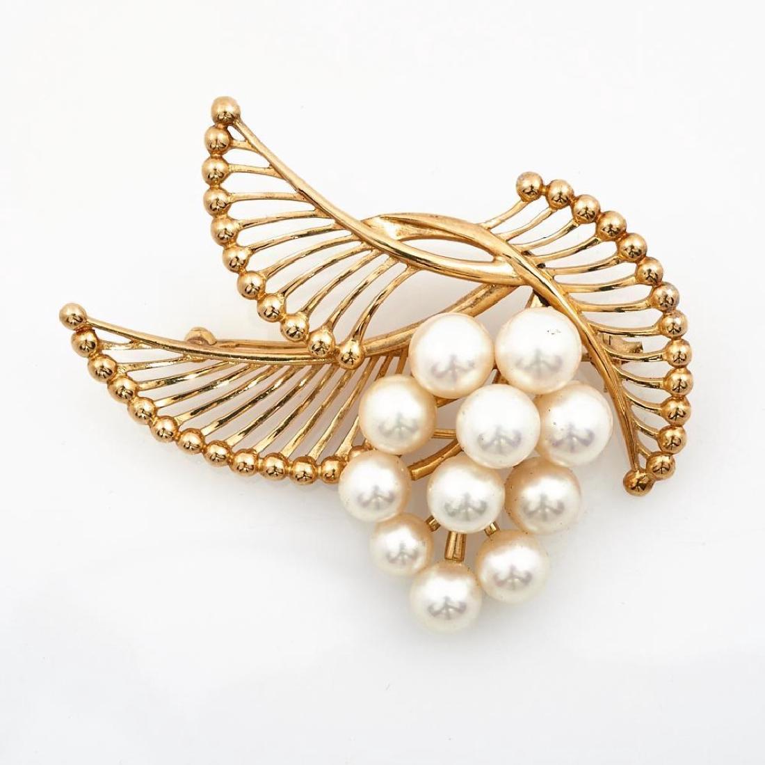 Cultured pearl and 14k gold brooch, Mikimoto: Weighing approximately: 17 grams; length: 2 in.Â