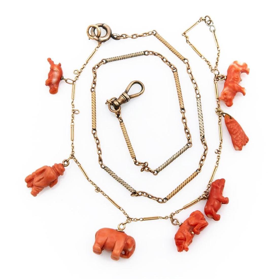 Carved charm and gold necklace (1 of 1)