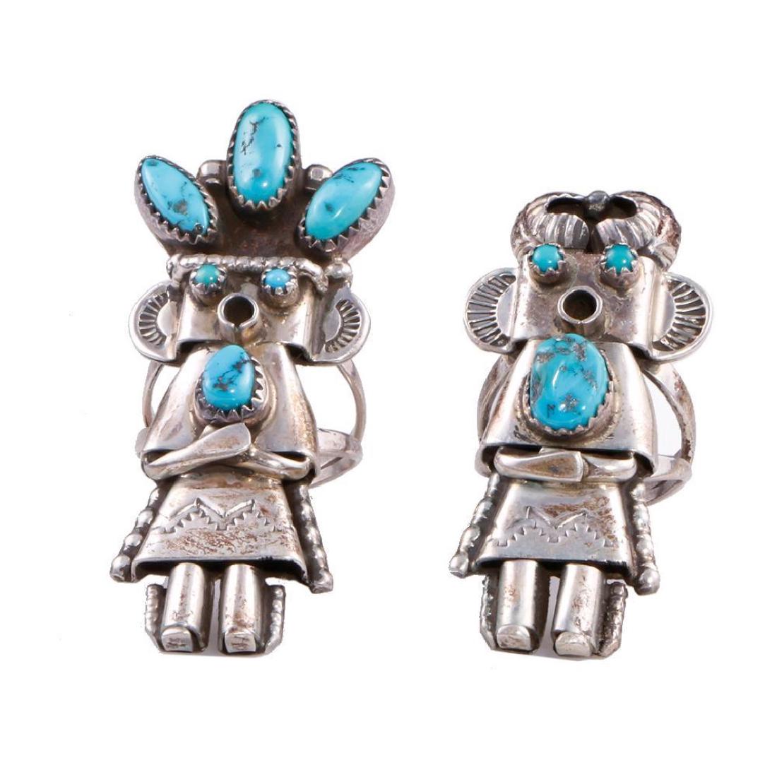 TWO SOUTHWEST TURQUOISE SILVER RINGS: Size: 2 5/16 inches in length (largest example), approximately Ring sizes range from: 6 - 7 1/2 approximately ?Total weight: 28 g. approximately