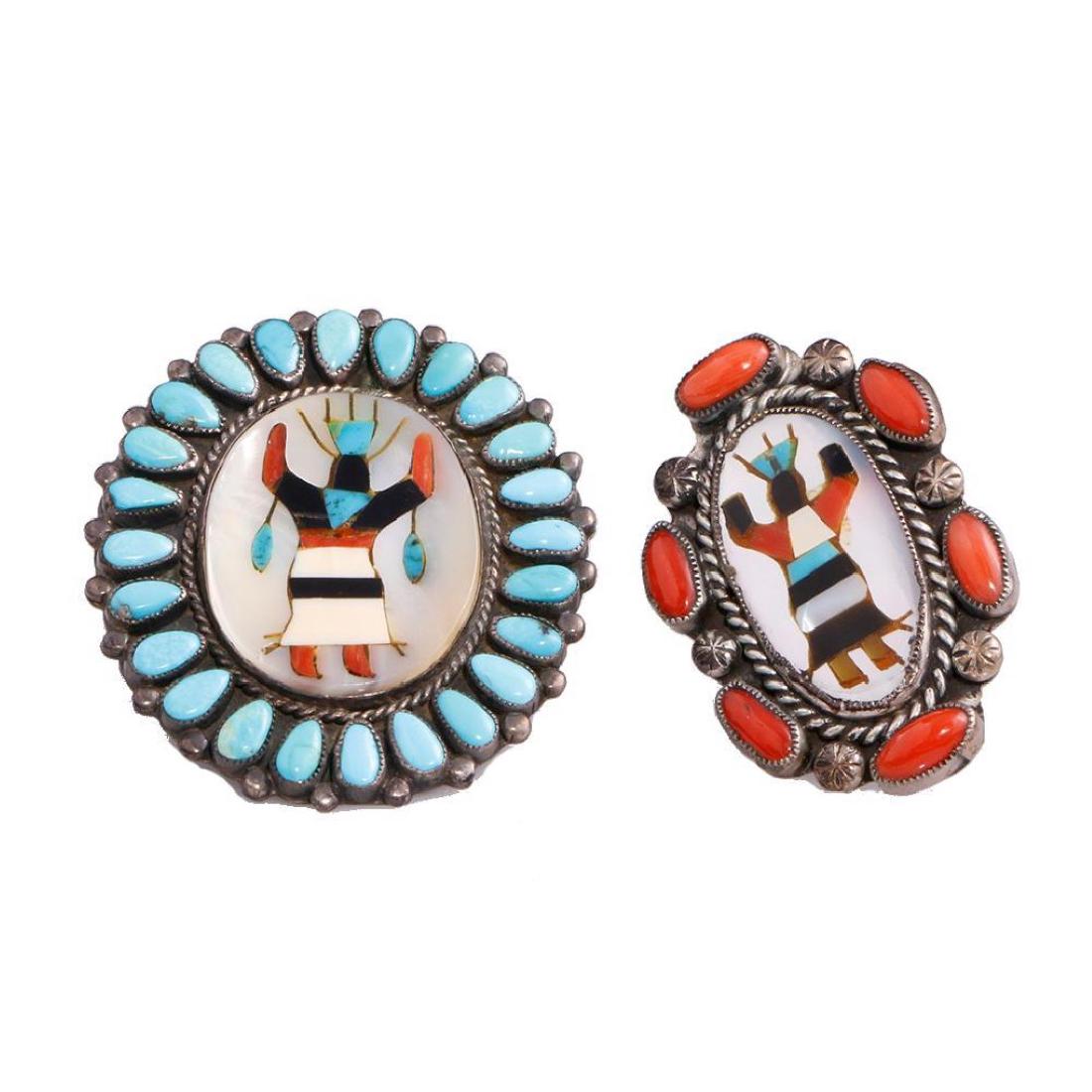 TWO SOUTHWEST TURQUOISE SILVER RINGS: Size: 2 inches in length (largest example), approximately Ring sizes range from: 6 - 7. approximately ?Total weight: 39 g. approximately