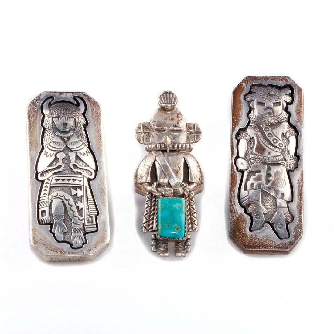 THREE SOUTHWEST TURQUOISE SILVER RINGS: Size: 2 1/4 inches in length (largest example), approximately Ring sizes range from: 7 1/2 - 8, approximately ?Total weight: 46 g. approximately
