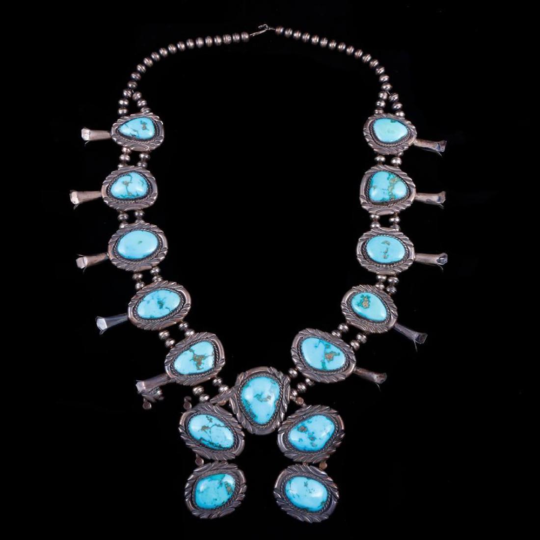 NAVAJO SQUASH BLOSSOM NECKLACE: Native American turquoise and silver squash blossom necklace Size: 16" in length Weight: 330 g