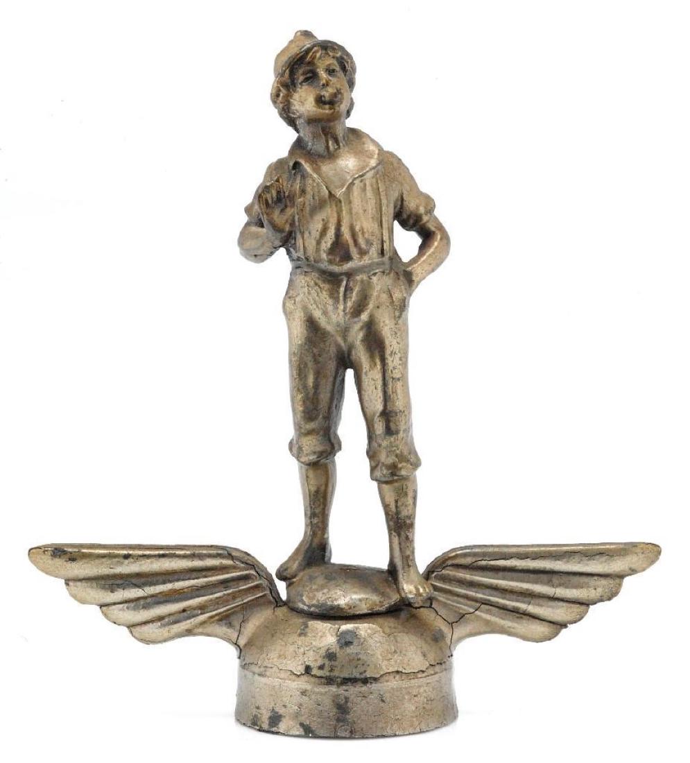 BOY SMOKING ON WINGED CAP MASCOT (1 of 4)