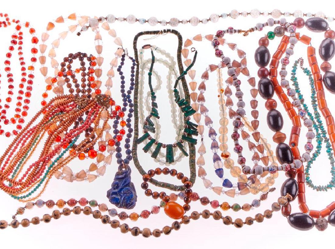Collection of beaded jewelry: comprising 50+ necklaces and bracelets, including tiger's eye, malachite, turquoise, glass and hematite Buyer pays shipping cost. (PLEASE GET A QUOTE ON THIS LOT.) For this auction, shipping is being