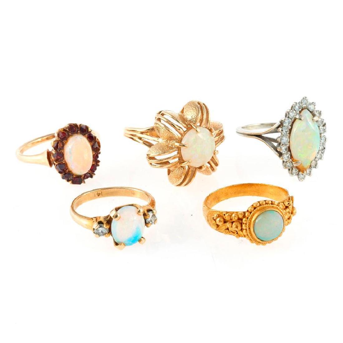 Collection of 5 opal, diamond and gold rings (1 of 1)