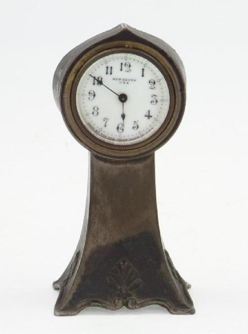 Art Deco Clock: New Haven Clock Co; Potmetal Casting, Windup Movement (Inop.), Nice Patina; 6"H; Good Condition. Buyer pays shipping costs.