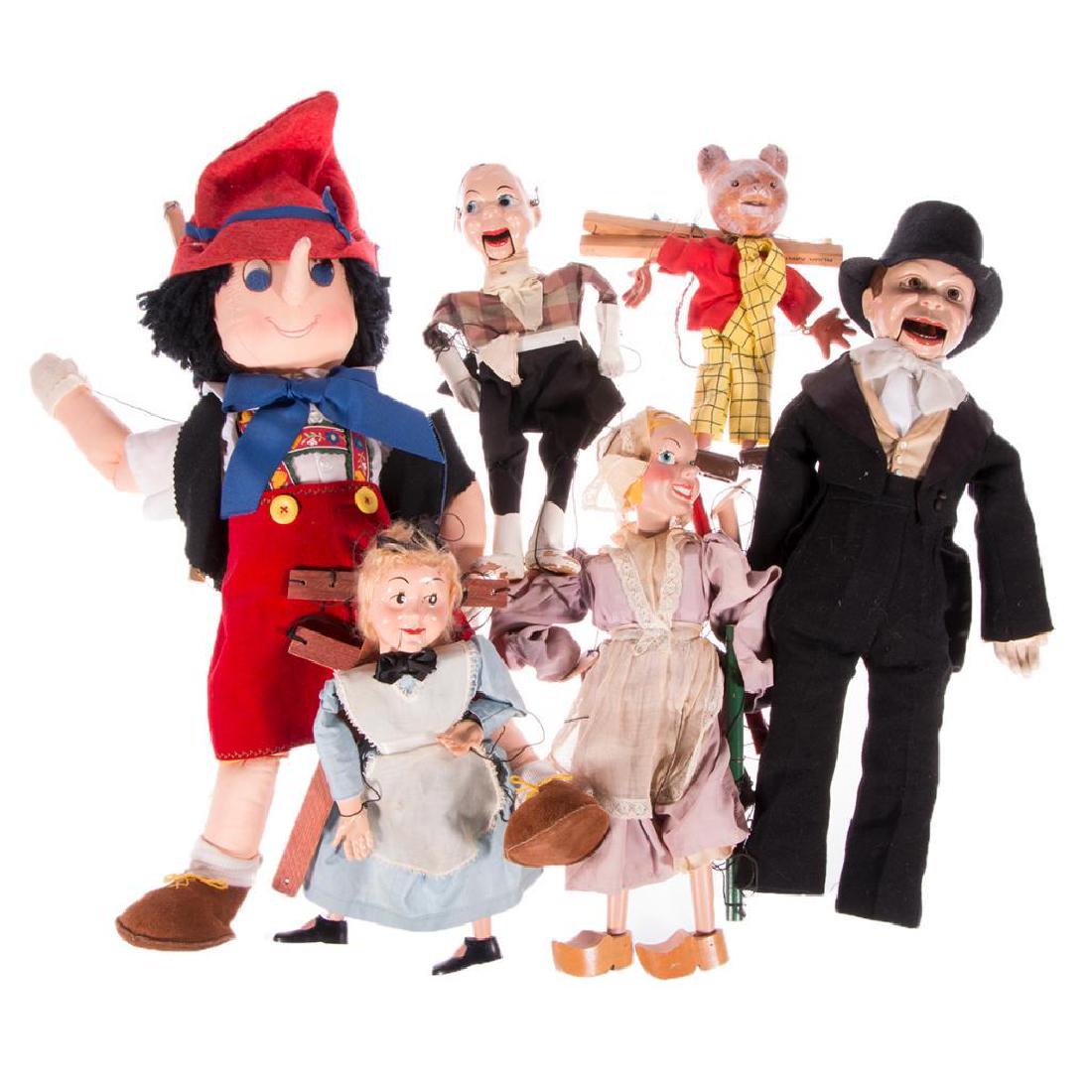 TOYS: A miscellaneous grouping of puppets, marionettes etc.