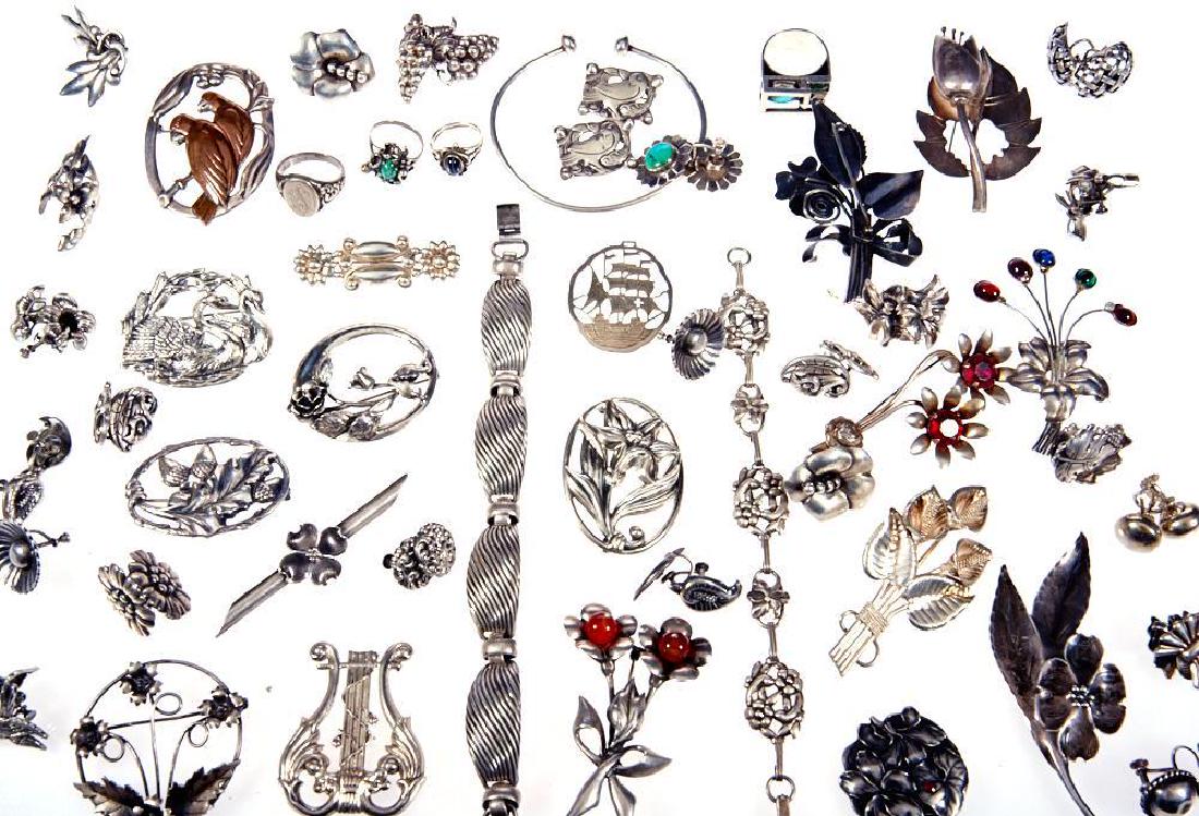 Collection of 45+ item of silver jewelry: including Napier, Monet, Lang, and Jewel Art