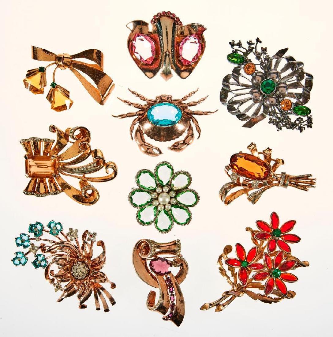 Collection of 10 rhinestone, stone, costume: and silver clips/brooches, including Kramer, Jolle, Perninno, Hobe, and deRosa