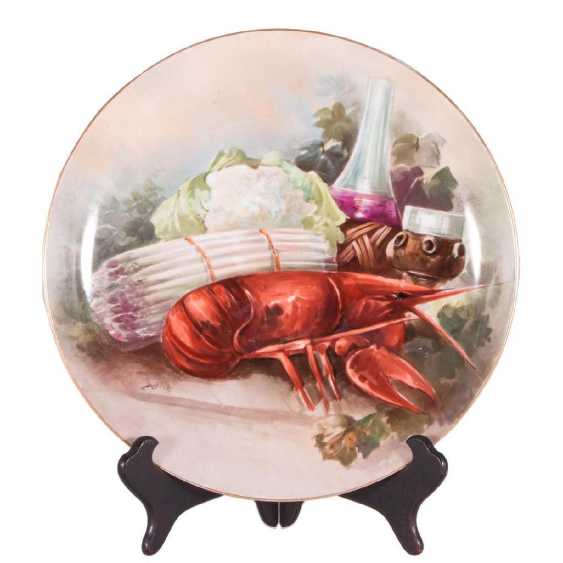 Large Limoge Charger with hand painted scene.: Unusually Large Limoges Charger with a hand painted scene of a lobster with asparagrass, califlower and wine. Signed Dubois. Condition: Excellent, Dimensions: Diameter-14"