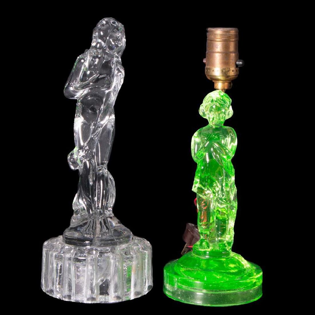 Green Depression Glass Figure of a Young Girl along wit: Green Depression Glass Girl mounted as a lamp. Modest Nude Female standing on circular base for flower arranging. First Quarter of the 20th. Century. Condition: Excellent. Dimension: Greatest H