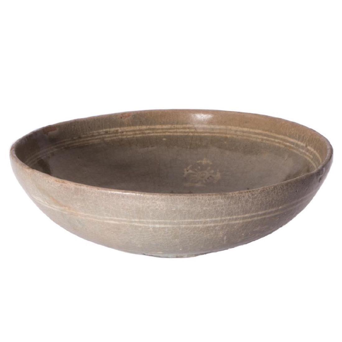11th century Korean Bowl.: An 11th century stoneware Goryeo dynasty (918 - 1392) Korean bowl. 2 1/4 inches high x 6 1/4 wide.