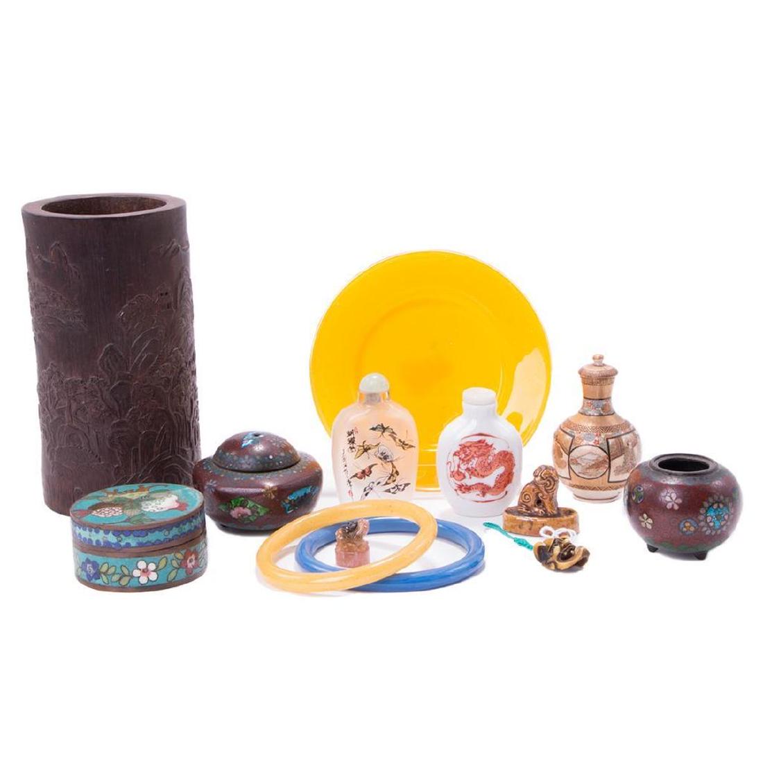 Lot of thirteen Chinese and Japanese decoratives.: Thirteen 19th century Chinese and Japanese decorative objects from 6 inches high: four Peking glass, three cloisonne, three porcelain, one each wood, ivory/bone, tourmaline.