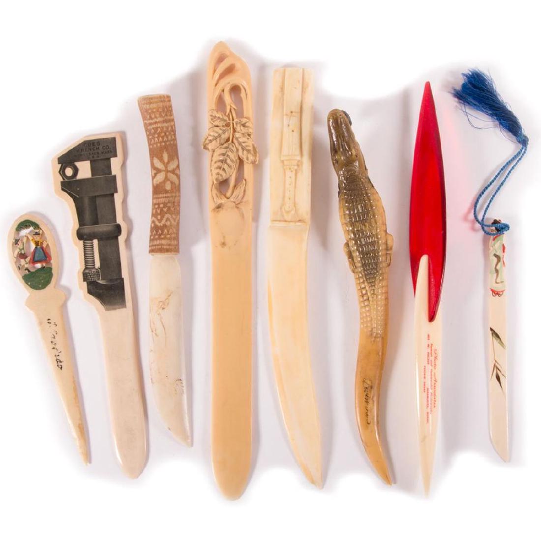 Lot of eight bakelite letter openers.: A lot of eight mid century bakelite letter openers of various themes.