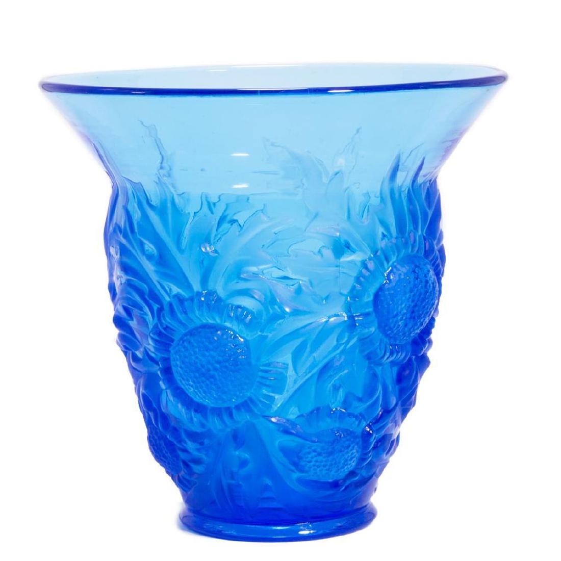 Blue Sunflower Vase, Signed Verlye.: Blue Molded Glass Vase with Sunflowers by Verleys. Condition: Excellent Dimensions: Height-9" Diameter-9"