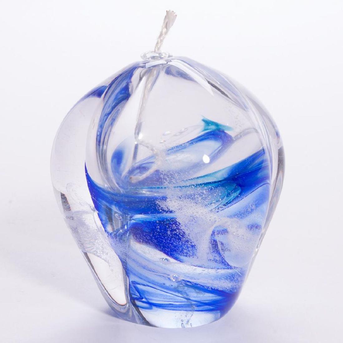 Signed glass string holder.: A blown glass string holder signed Michelle Kaptur measuring 4 inches high x 3 1/2 diameter.