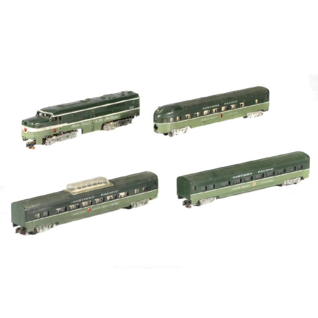 AF S Great Northern Locomotive with 3-Car Passenger Lot: AF S gauge Great Northern locomotive and three-car passenger lot comprising 21551 powered Alco PA locomotive with 24846 Coach, 24849 Vista Dome, and 24853 Observation. Locomotive and cars have rust on