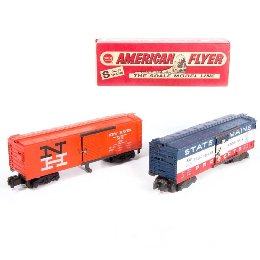 AF S 24029 BAR Boxcar and 25082 NH Operating Boxcar: AF S gauge 24029 BAR boxcar and 25082 New Haven operating boxcar with complete original box. BAR boxcar has one cracked door, some light rust. Cars are C6-C7. Operating boxcar has some glue residue, b