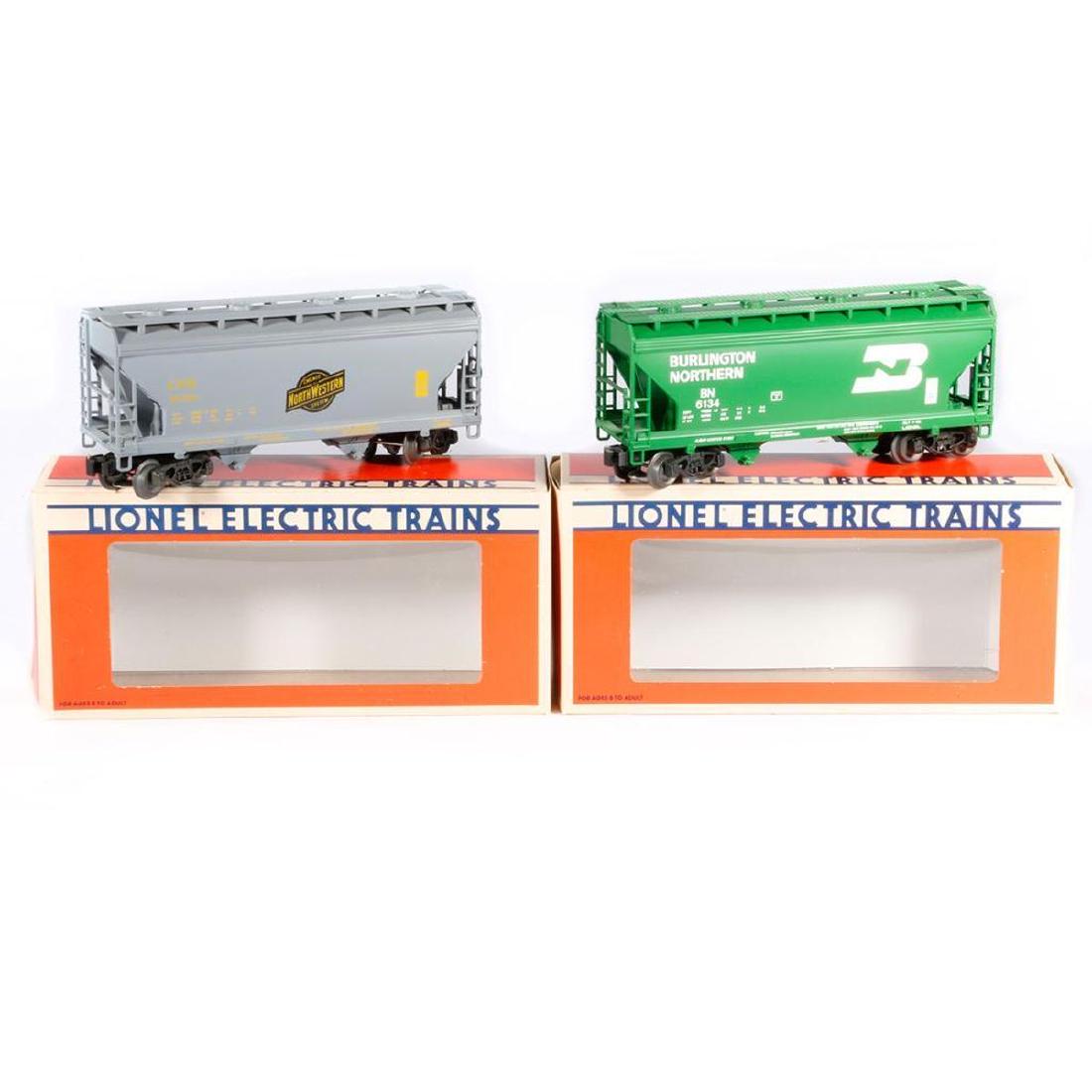 Lionel O Gauge 6-6134 BN and 6-6135 C&NW 2-Bay Hoppers: Lionel O gauge 6-6134 BN and 6-6135 C&NW 2-Bay Hoppers with original boxes and 9-6190 Assortment Master Carton. All are C9. This was a direct to consumer sale by Lionel and the cars were not available