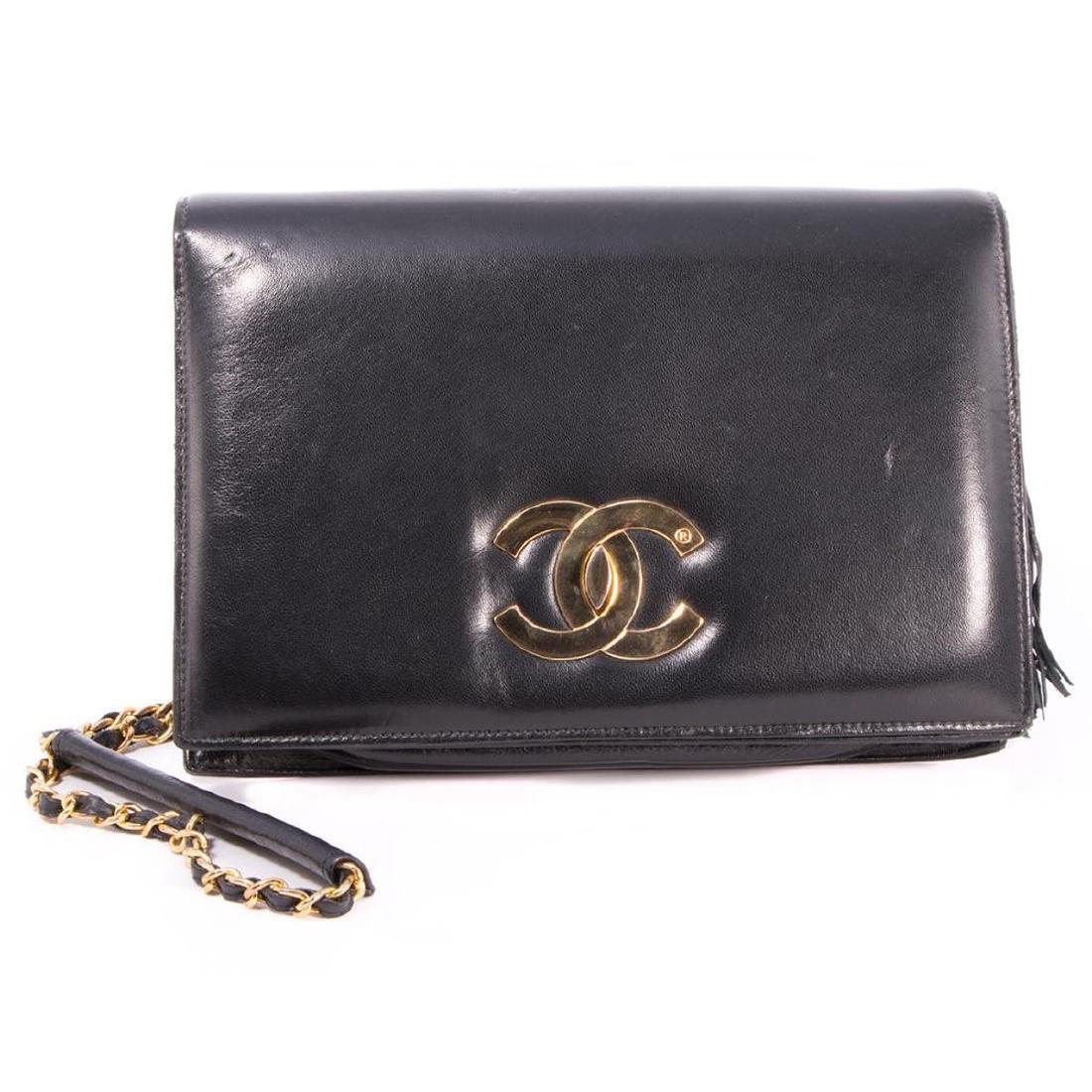 Chanel Paris Vintage Leather Double C Flap Bag: black; circa 1970's; measuring 10 7/8 x 9 1/2 x 3in. (normal wear, with impression of strap on reverse)