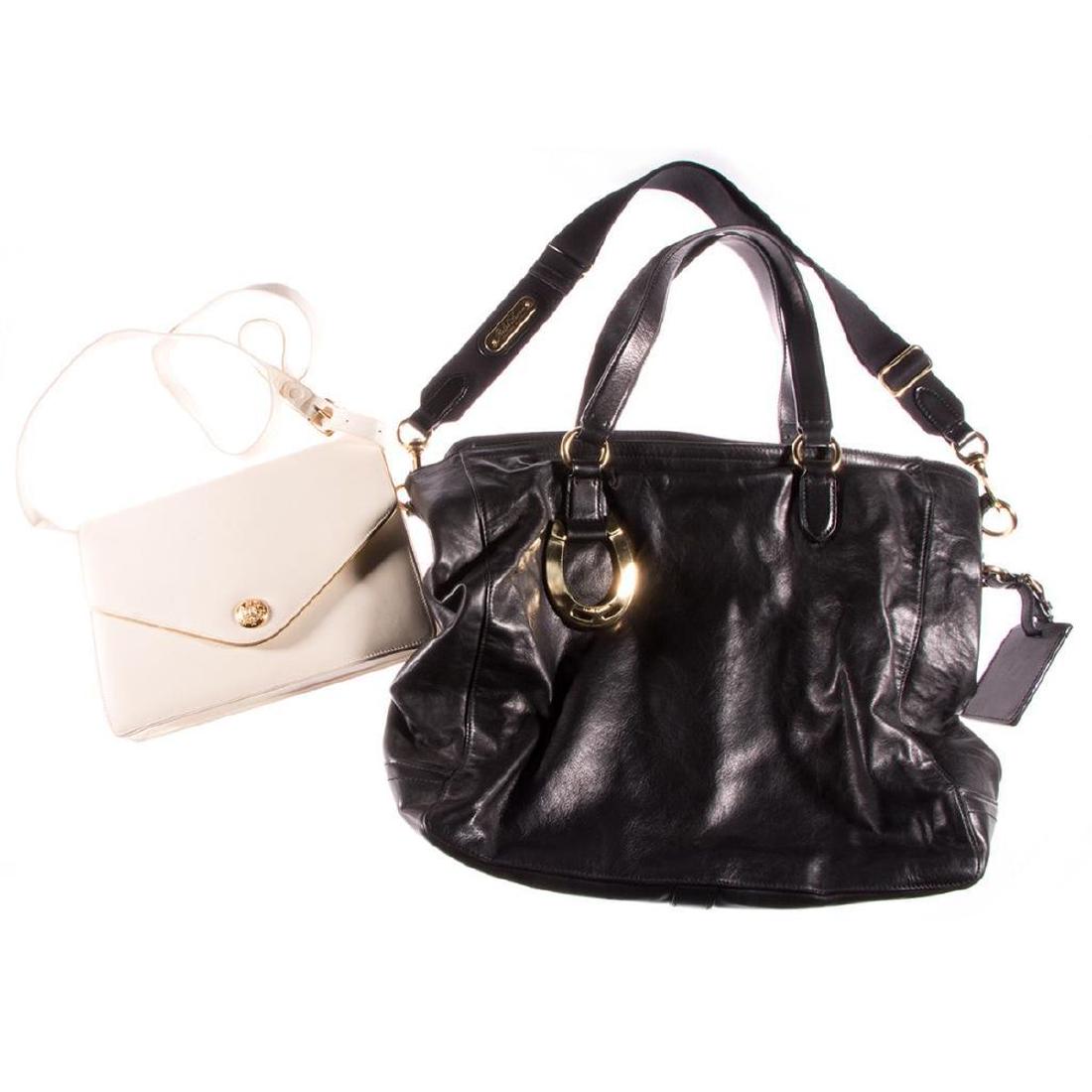 Two Ralph Lauren leather bags, purses: black satchel, measuring 18 x 12in. and white envelope style measuring 9 1/2 x 7in.; both with moderate wear.