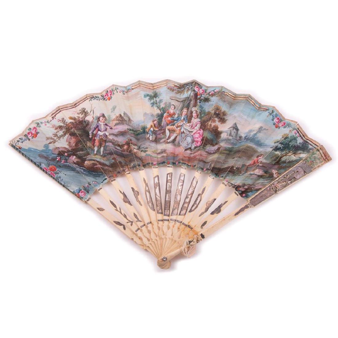 Antique painted, bone fan: pastoral motif, with pierced and carved sticks, and guards decorated with silver, and paste rivet; with hinged box; 27cm (damage)