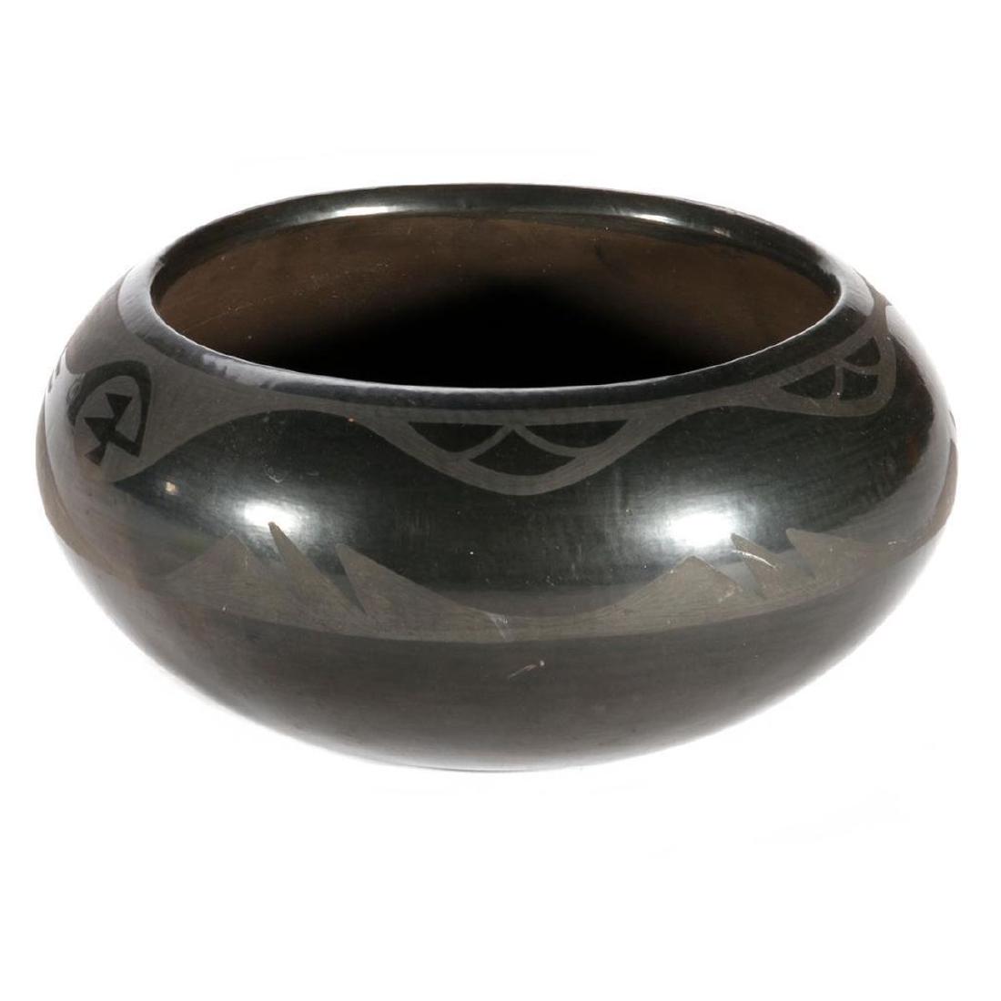 A San Ildefonso Blackware Bowl: By Florence Naranjo; though somewhat thick-walled, the painting closely parallels the style popularized by Maria Martinez and her family Height: 4 1/2in, Diameter: 10in