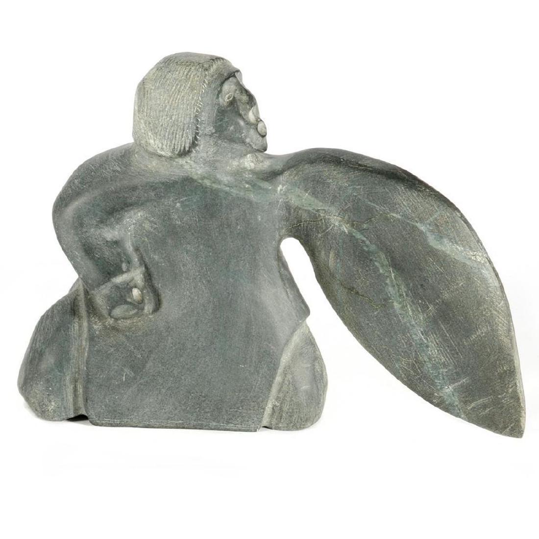 An Inuit Stone Sculpture: Basil Aptanik, "Transformation" Height: 8in, Width: 10 1/2in