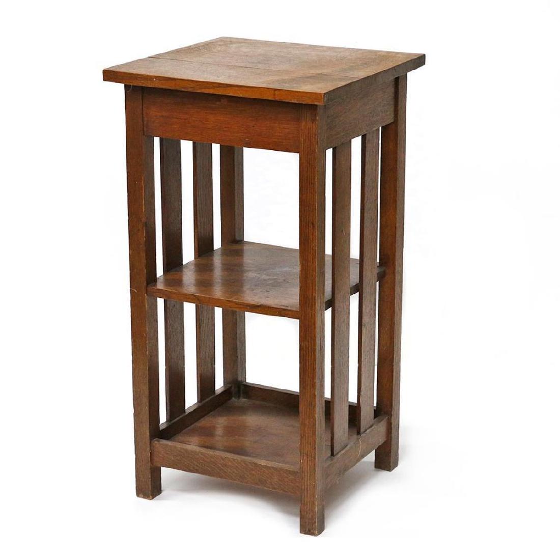 Arts and Crafts Furniture: Two Arts and Crafts tables measuring 40" high x 16" wide x 12 1/2 deep and 35" high x 18 1/2" wide x 18" deep.