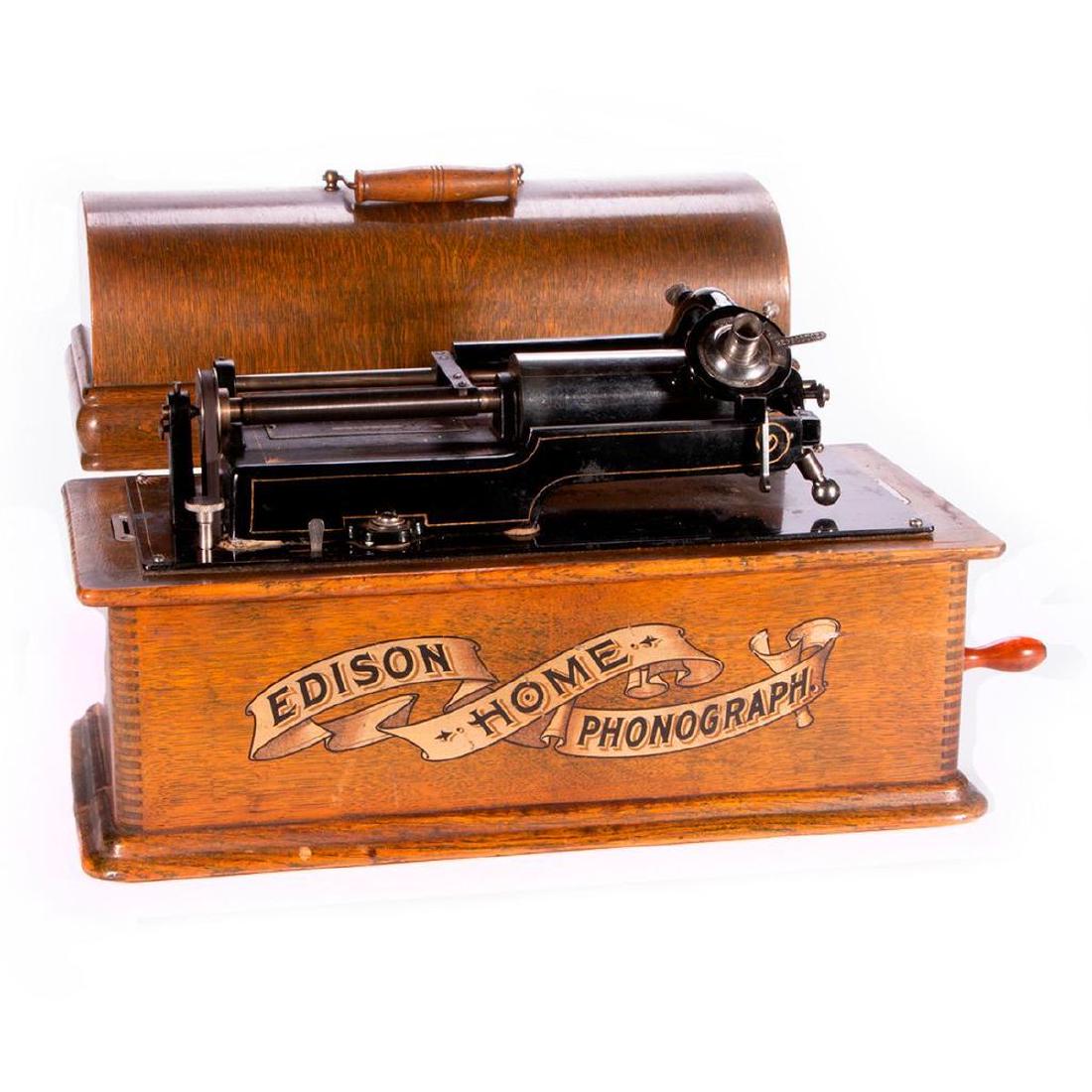 An Edison Home Phonograph and cylinders.: A 19th century Edison Home Phonograph with a large collection of cylinders.