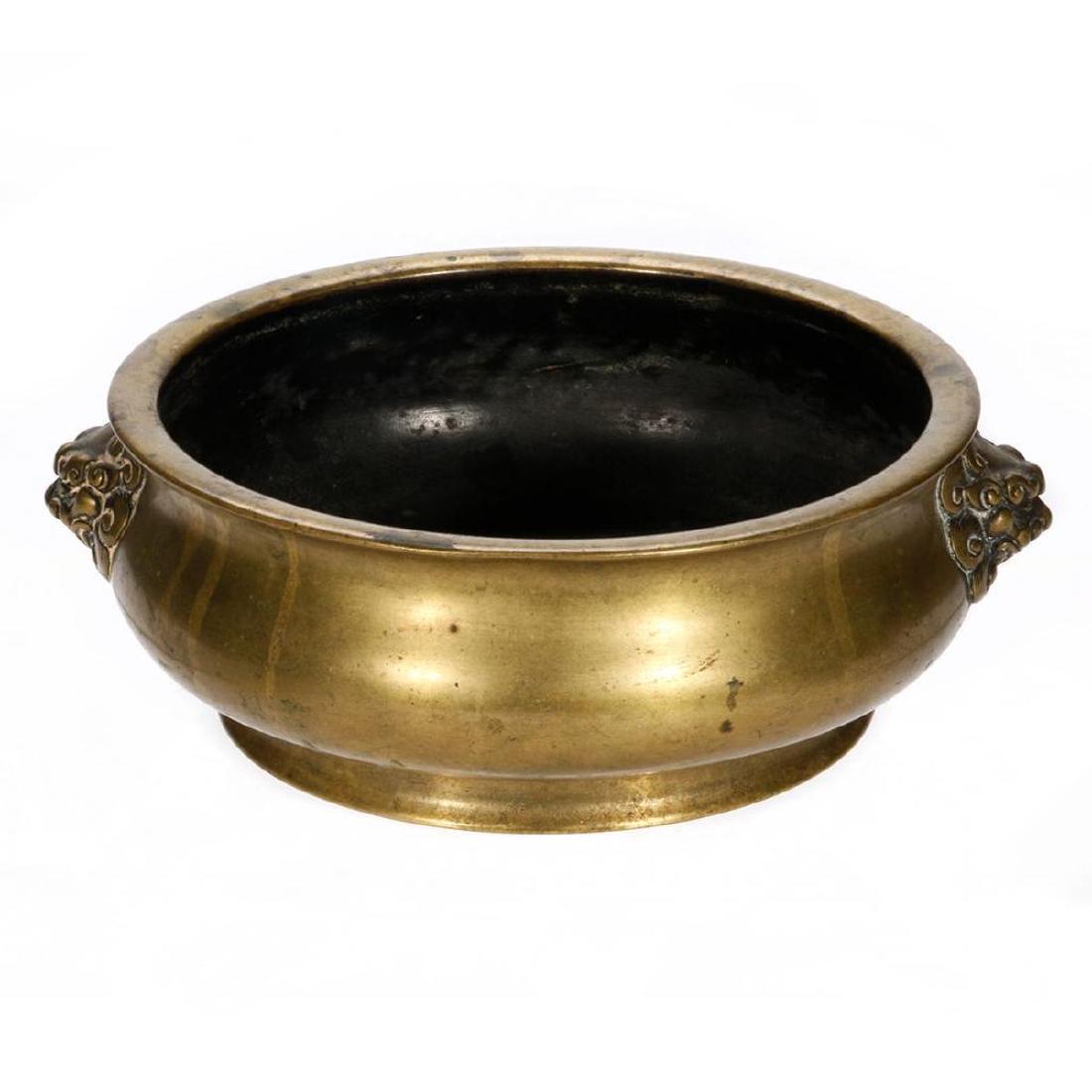 Chinese bronze censer in the Ming style.: A finely cast 19th century Chinese bronze censer with 16th/17th century Ming dynasty mark, 2 1/2 inches high x 6 1/2 wide.