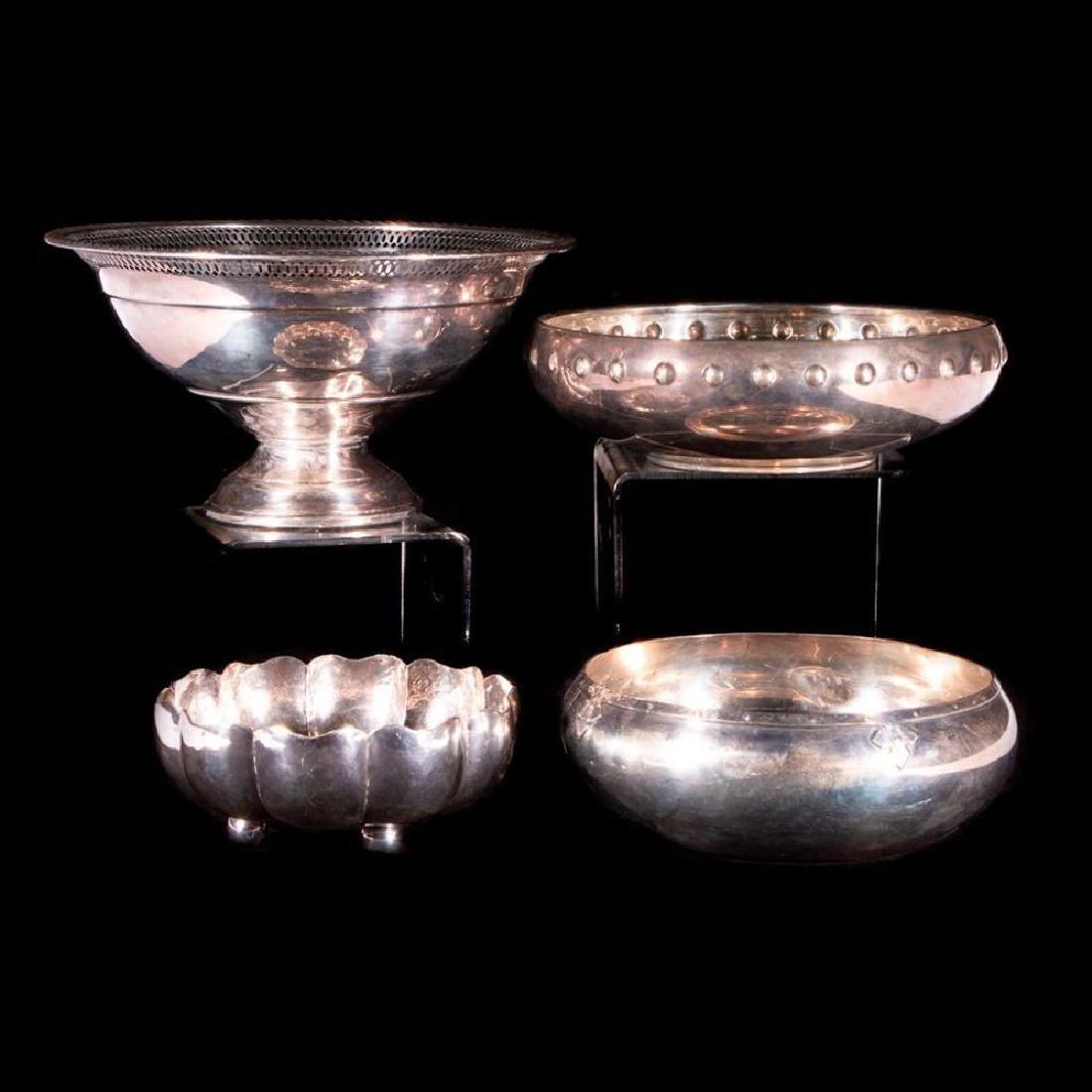 Three sterling bowls and one weighted sterling bowl. (1 of 9)