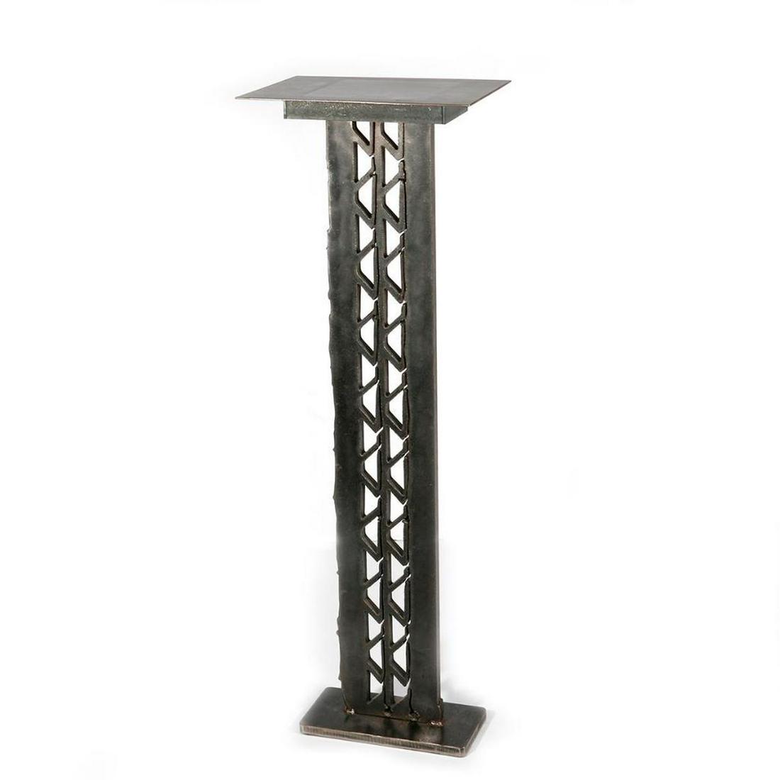 A steel plinth.: A steel plinth measuring 46 inches high x 14 wide.