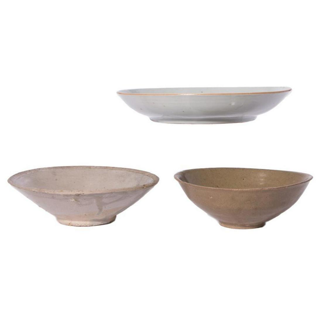 Three Chinese Song dynasty bowls.: Three Chinese Song dynasty (960 - 1279) celadon porcelain bowls measuring 1 1/2 inches high x 8 1/2 diameter, 2 inches high x 6 1/2 diameter and 2 inches high x 6 diameter.