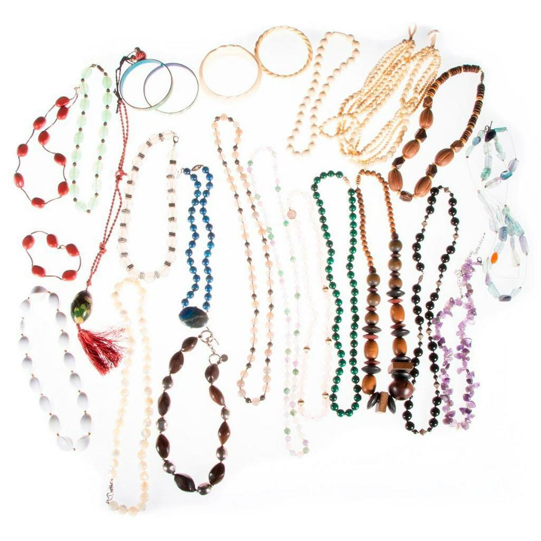 Collection of beaded, silver and costume jewelry: including Erwin Pearl, Monet, St. John, Carolee, Michael Dawkins, Linda Levinson including malachite, lapis, rose quartz, bone, rhinestone, onyx, wood, enamel and glass consisting of 19 necklaces, 17