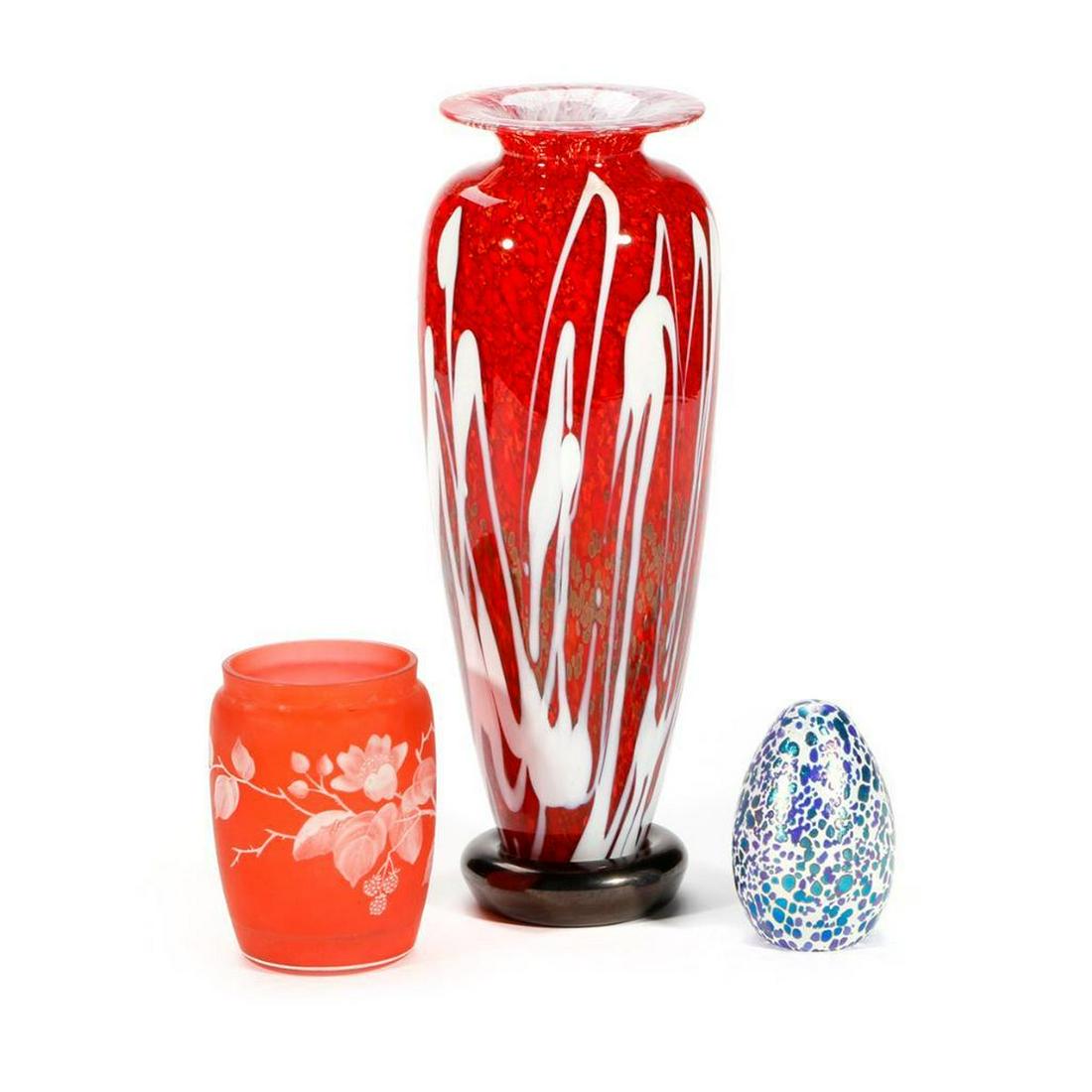 Three pieces of Art Glass.: Three pieces of Art Glass, an unsigned frosted vase with flower motif, a paper weight signed Orient and Flume and the largest, a vase measuring 13 inches high x 4 1/4 diameter signed Sutherland 2006.