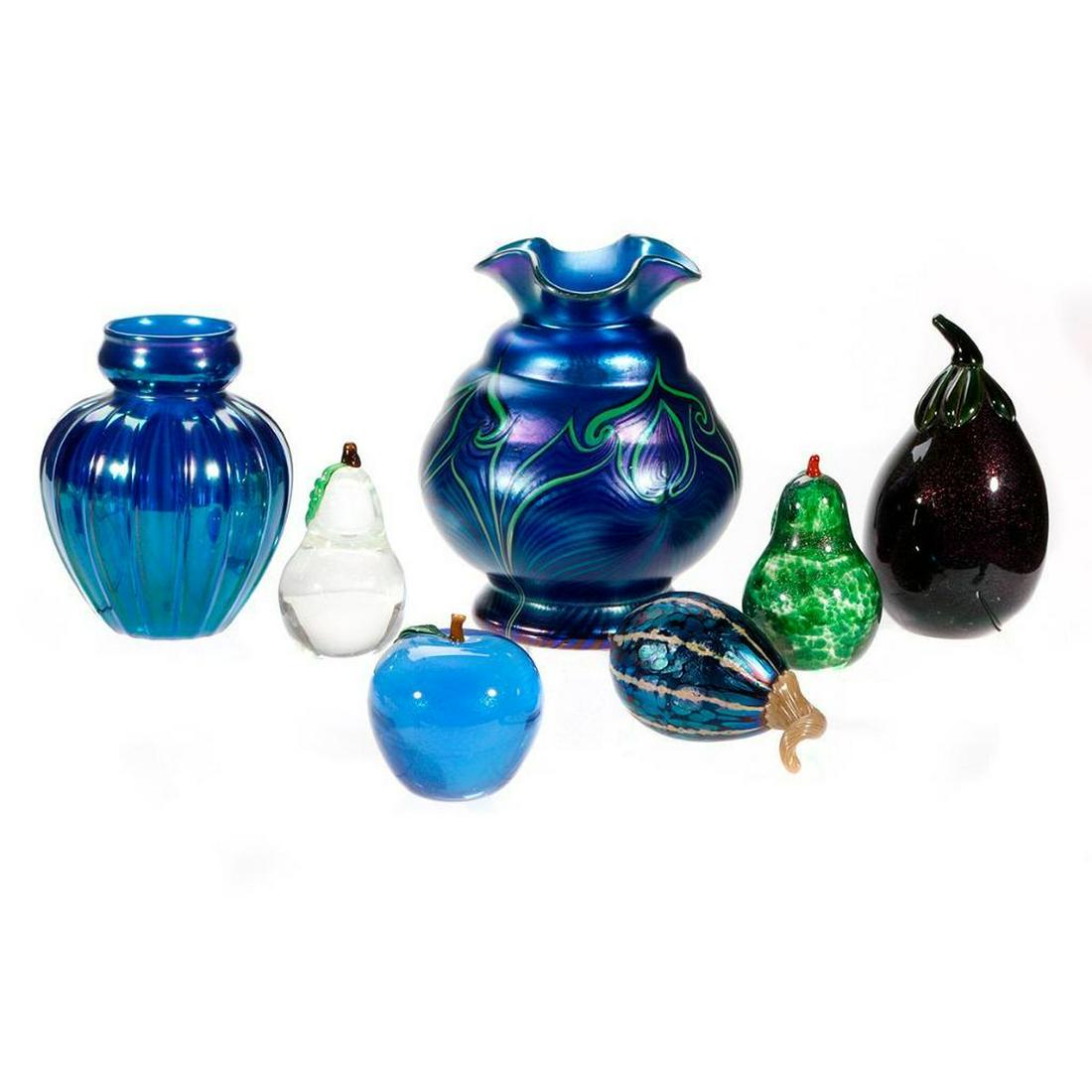 Seven pieces of Art Glass.: Five Orient and Flume Art Glass paper weights in the form of fruit and two vases.