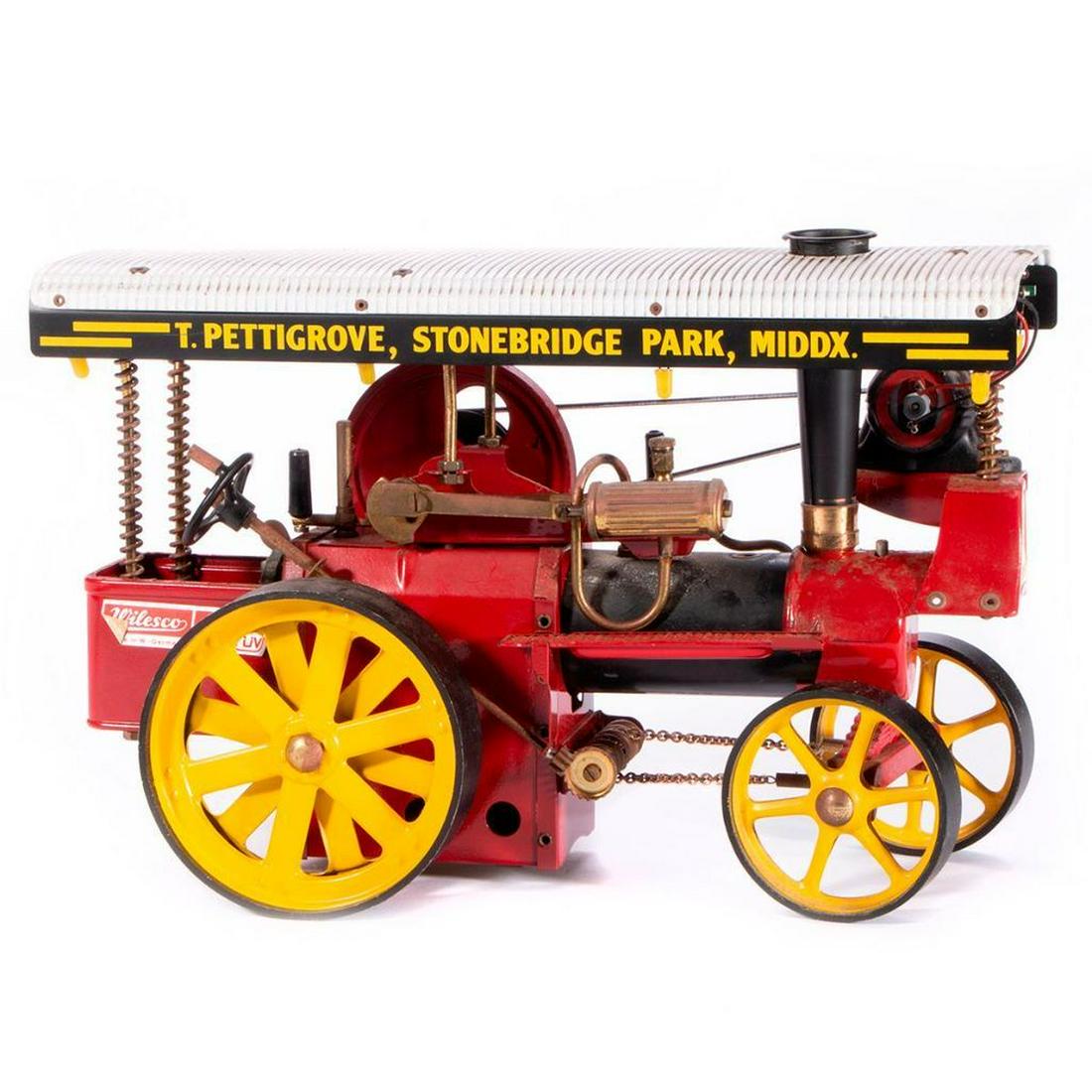 Vintage toy tractor.: A vintage German Wilesco toy tractor marked made in W. Germany. 7 1/2 inches high x 12 x 6. Items are sold as is. Please inquire about condition if not otherwise stated.