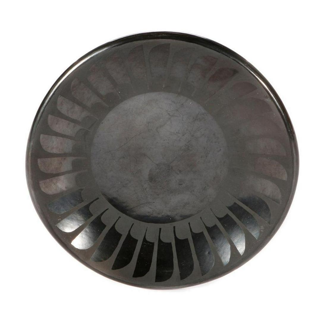 San Ildefonso plate: San Ildefonso plate (5 7/8") Maria Martinez and her son Adams's wife Santana Roybal Martinez 1943-1956, traditional black on black with feather design