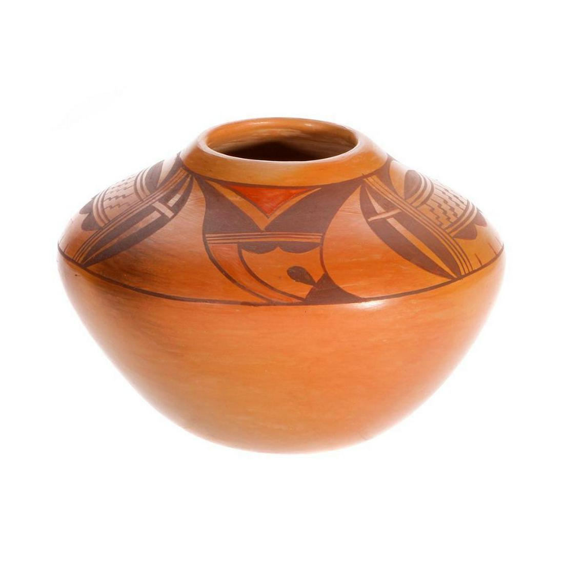 Hopi bowl: Hopi bowl, Tan bowl with darker brown and orange design, (4 1/4" x 6 1/4") by Coleen Poleahla. (marked with her clan, Fire Coyote)