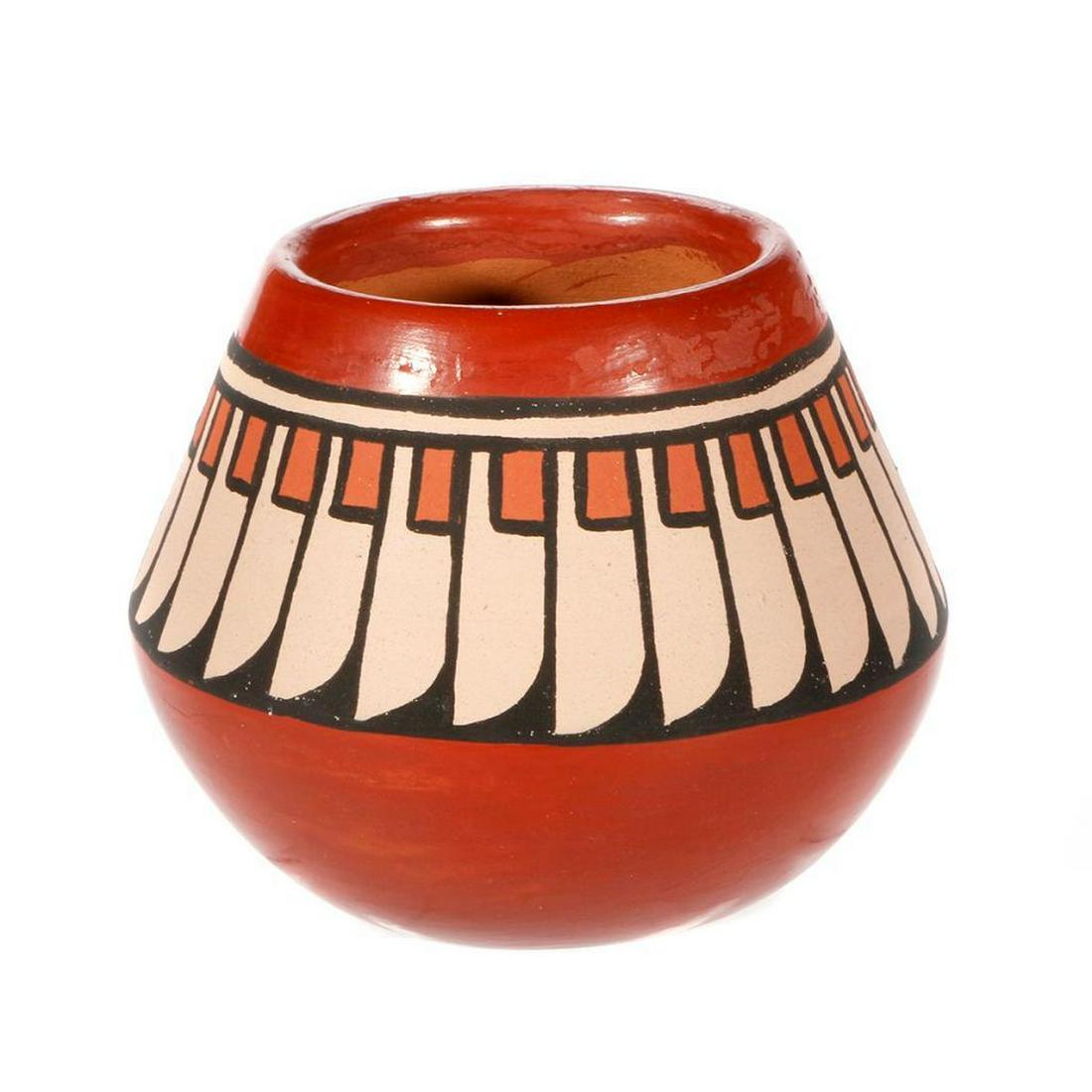 Santa Clara pot: Santa Clara (3 ½€ x 3") small pot, redware w/feather design; by Minnie Vigil; older pot (c. 1970)