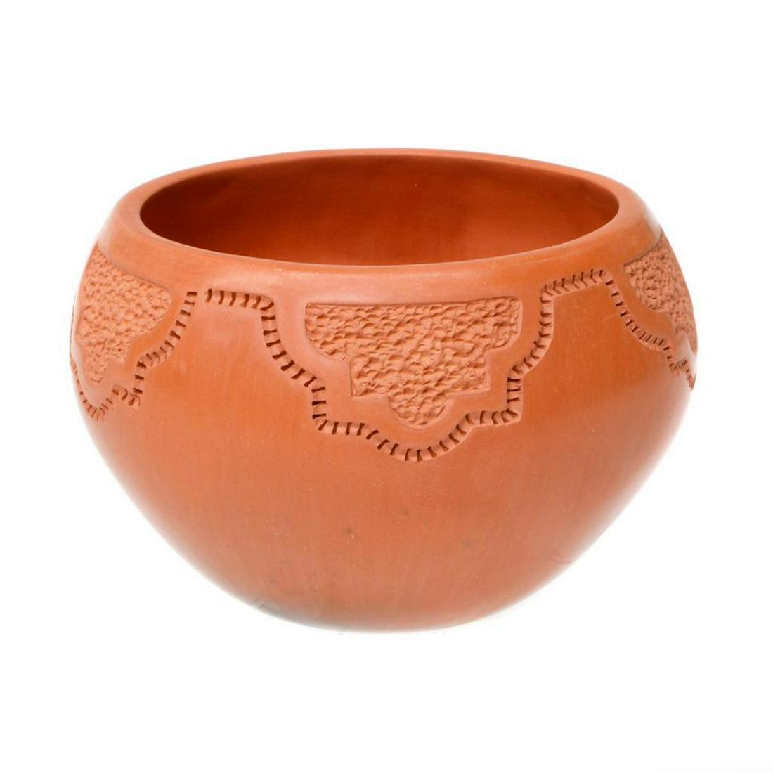 Isleta decorated bowl: Isleta (5" x 3 1/4") red/brown decorated bowl by Caroline Corpio, bought from Caroline