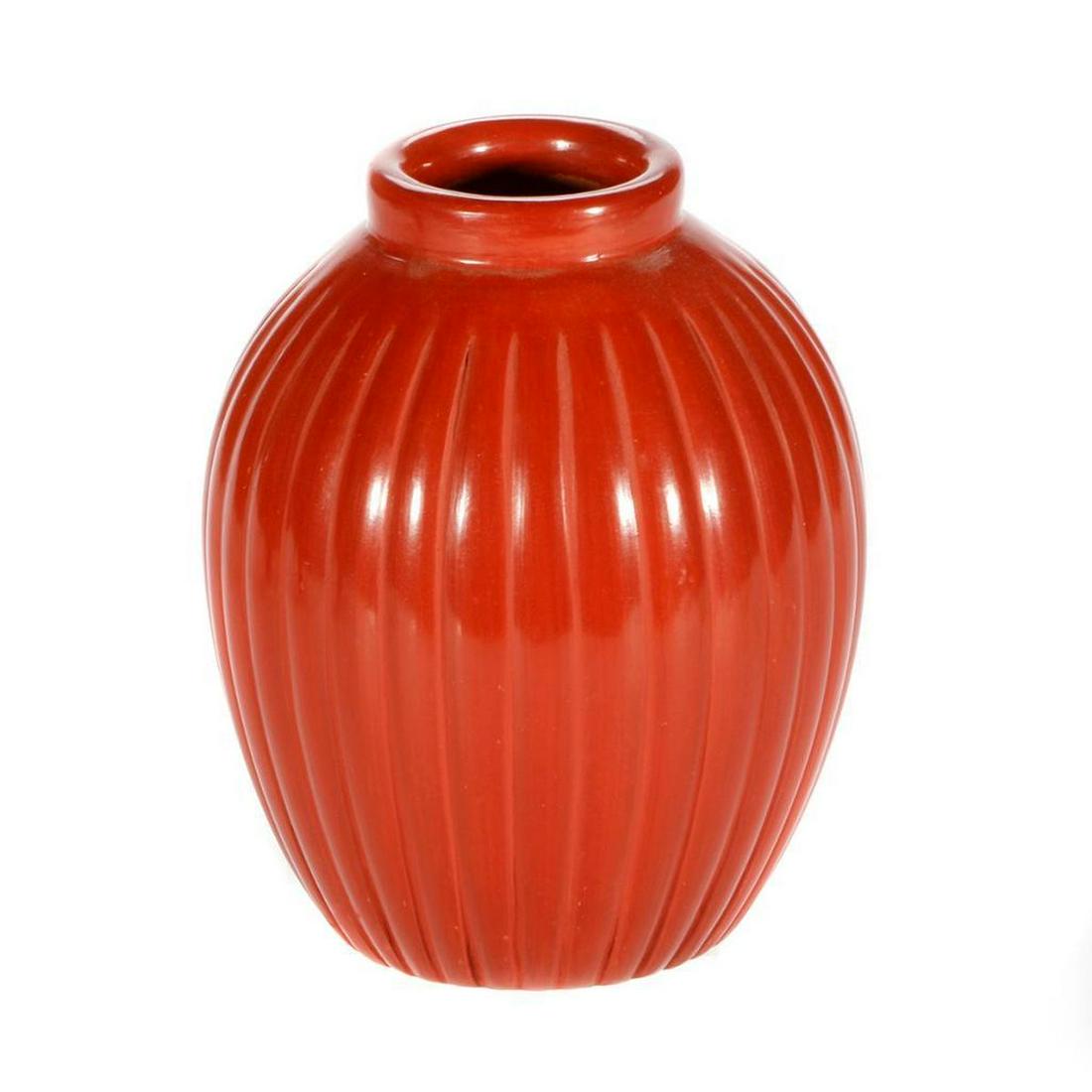 Santa Clara jar: Santa Clara squash jar, signed "Baca". Size: 5 1/4 x 4"