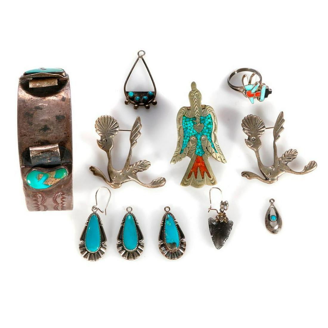Old Pawn Southwest Jewelry: Miscellaneous grouping of southwest jewelry including earrings, brooches, pins, cuff bracelet, ring by by Navajo jewelers. Weight: 98 g.
