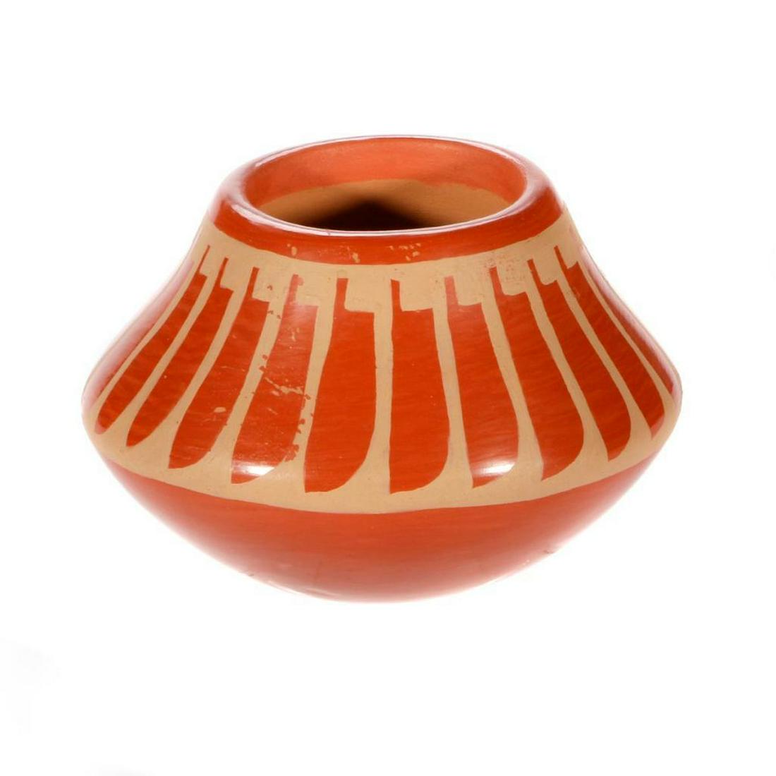 San Ildefonso bowl: San Ildefonso bowl, buff on redware with feather pattern (3 ½‚¬ x 5 1/4") dated 2005 by Doug and Charlotte Vigil